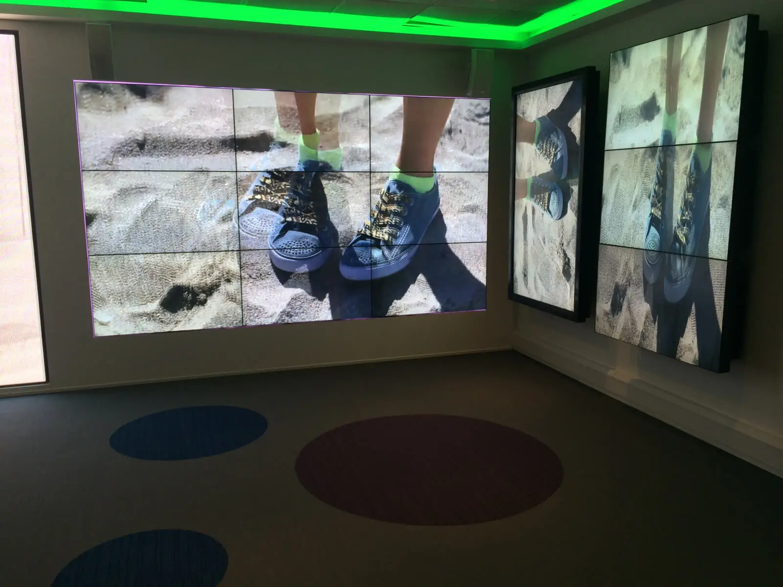 PEL UK Offices space with designer furniture and wall mounted digital screens 22